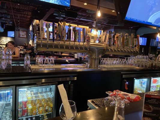 Bar (in the center of the room) with tons of taps.