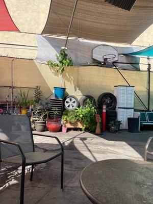 Waiting area has a basketball hoop