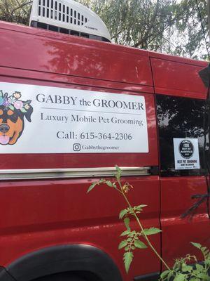 The Groomers specially equipped red truck.