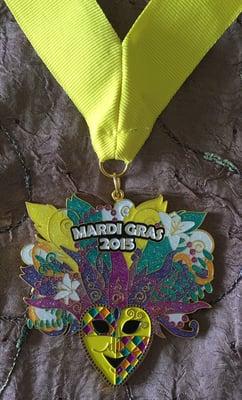 Apparently, the advertised medal (with the blue neck piece that said Mardi Gras run) was only for 15K runners.