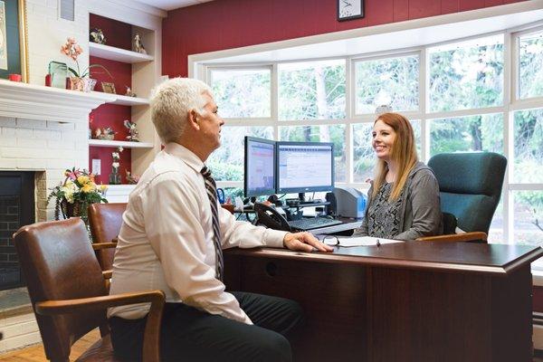 Two of our Yardley employees having a quick discussion about a client's policy.