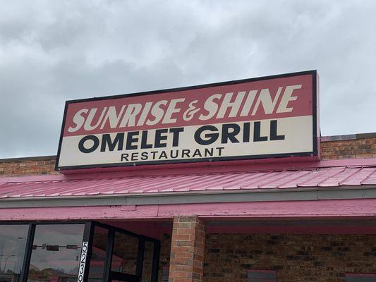 Sign above building