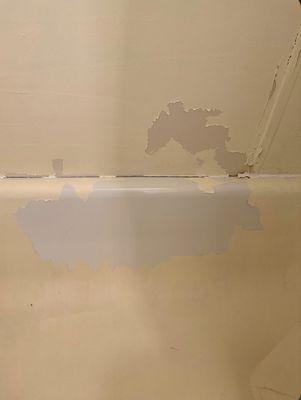 Bathtub and shower walls were painted and now peeling with every shower and every time we clean it.