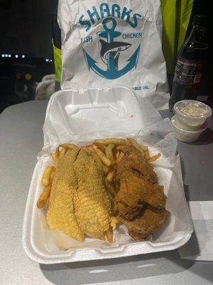 Combo plate. Fried tilapia with lemon pepper wings and fries.