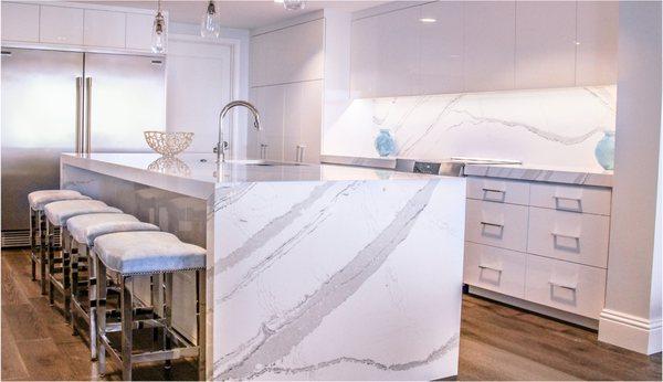 Kitchen remodel with new cabinets and some cabinet refacing.  Also new countertop and backsplash.