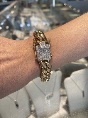 A Cuban bracelet with diamonds.