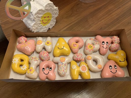 Smiley face/Flower Power birthday donuts