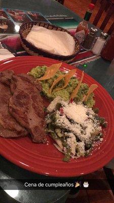 Carne asada with guacamole and cactus salad