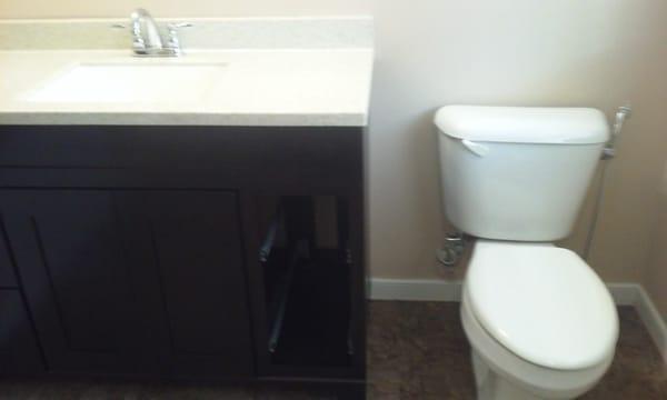 Installed plumbing fixtures for a powder room.