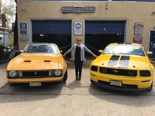 Yvonne Mulhern posing with her cars of choice!