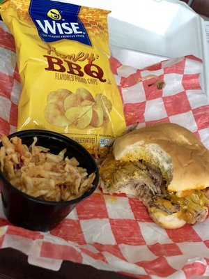 Pulled pork sandwich with slaw on the side