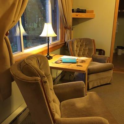 cozy sitting area and table inside cabin #1