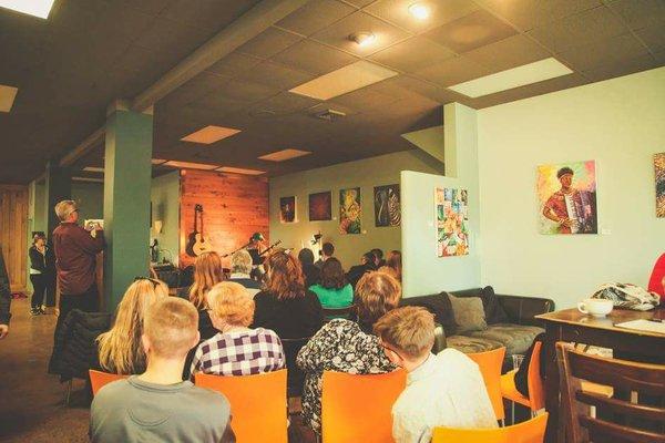 Audience listening to an open mic we have the pleasure of hosting here every two weeks.