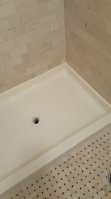 Old shower base refinished in Kohler Biscuit color