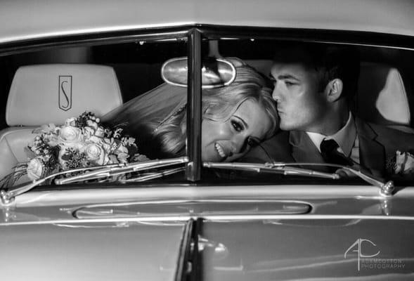 Couple shoot inside a Studebaker