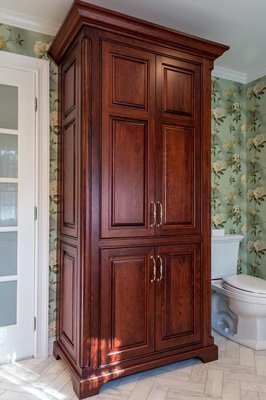 Our Westchester OG Door Style on this Cherry stained Mahogany Linen Closet.