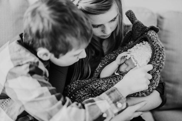 Siblings with newborn