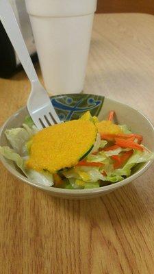 Nice and fresh salad with a sweet citrus ginger dressing.  Small, but a tasty palate cleanser to start the meal.