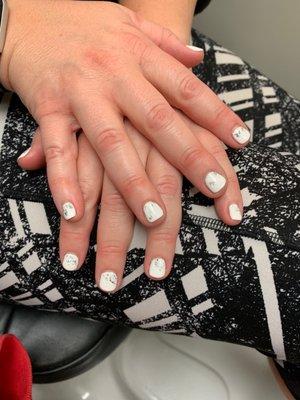 Shellac nails with a foil accent.