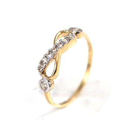 http://www.amazon.com/Yellow-Gold-Twisted-Line-Rings/dp/B006BDFKTQ/ref=sr_1_2?s=jewelry&ie=UTF8&qid=1339793868&sr=1-2