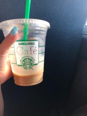 Iced caramel macchiato with almond milk that the lady made