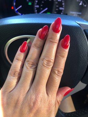 Red dip powder over real nails. Make an appointment with Ruby!