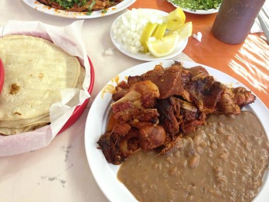 Birria w/beans, handmade tortillas.