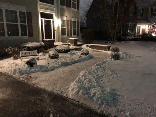 Removing the snow from the walkway