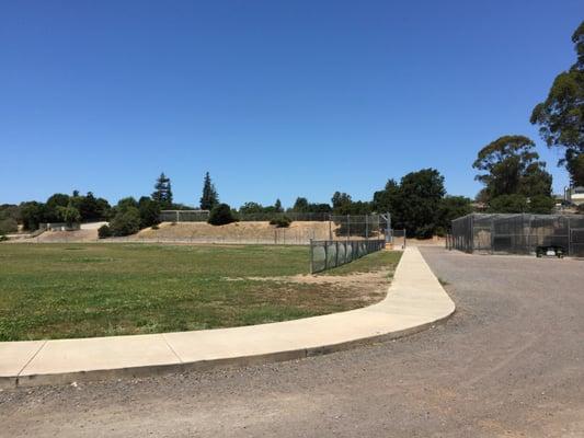 One of two baseball fields, plus the batting cage