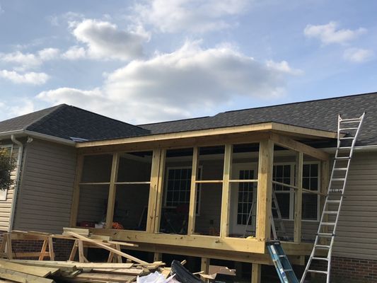 New screen porch being built