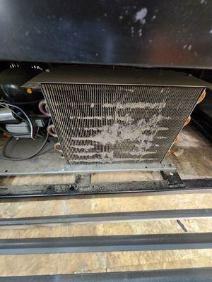 Dirty evaporator coil on a reach in cooler causing system malfunction. This can be avoided with regular maintenance.