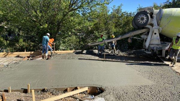 Pouring concrete paving