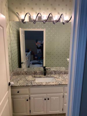 Gorgeous new Granite on sink (don't mind the wallpaper that is being removed!)