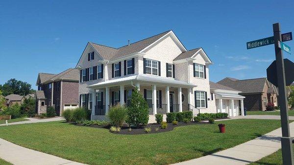 Shingle install with standing seam metal porch roofing by Bulldog Home Improvements