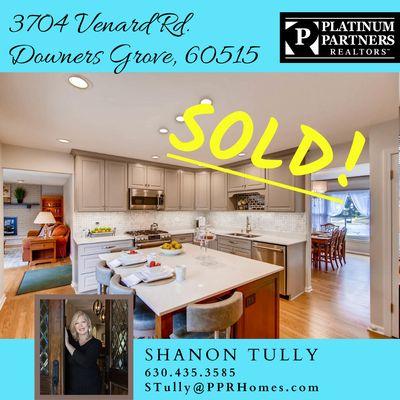 Happy clients completing a successful  sale of their staged home in Downers Grove!