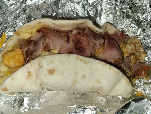 MIgas taco add potatoes and ham.