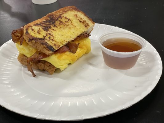 The Negotiator.  French toast, bacon a d eggs with cheese with side of maple syrup.  It's a 10!