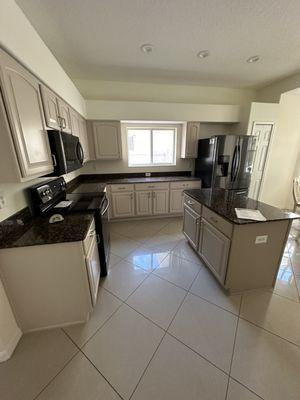 Richard and his team completely redid our kitchen cabinets from the old brown to this beautiful color with new hardware!! Amazing.