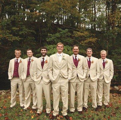 great way to coordinate your bridesmaids colors with the tuxedos!