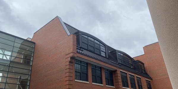 Port Chester High School.  Petersen Aluminum / PAC-CLAD Metal Roofing 12" Tite-Loc Panels on the school's dormers.