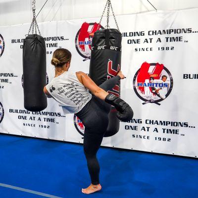 Unleash your inner warrior and redefine your limits with women's kickboxing at Haritos Martial Arts, empowering mind, body, and spirit.