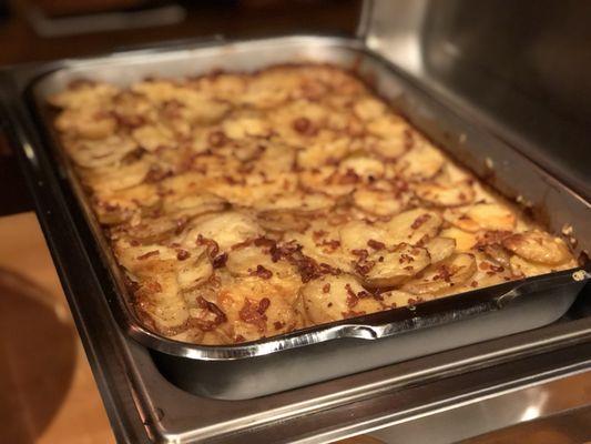 Our incredible aged white cheddar scalloped potatoes