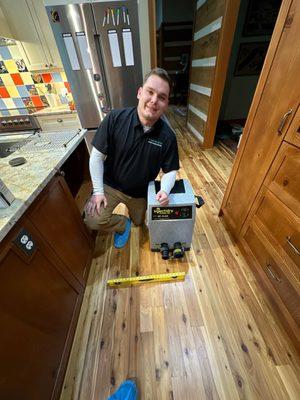 the mitigation team manager, Josh, drying out the floor!