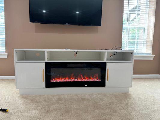 TV stand and fireplace assembly