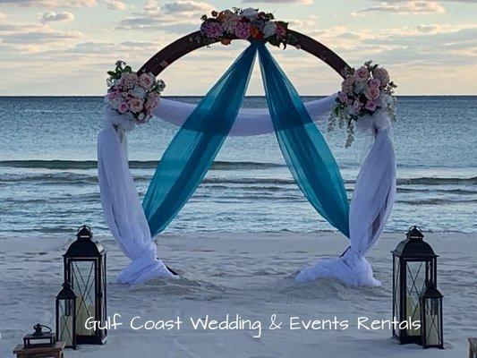 Circle arch with chiffons and flowers