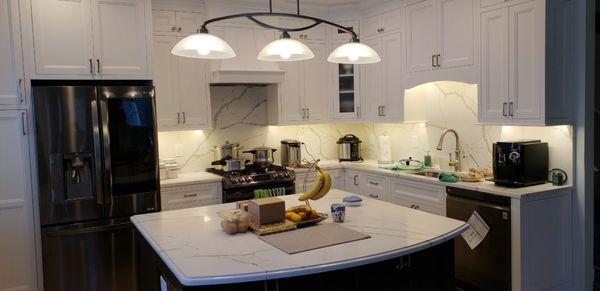 White Kitchen Cabinets with Island By Sociel Cabinet Solutions