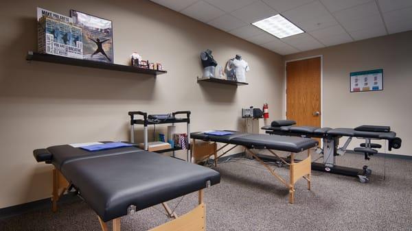 Electrical muscle stimulation and Spinal Decompression tables.