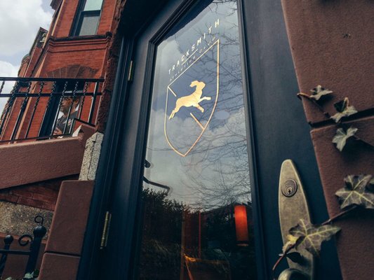 We are located within the Tracksmith Trackhouse at 285 Newbury Street