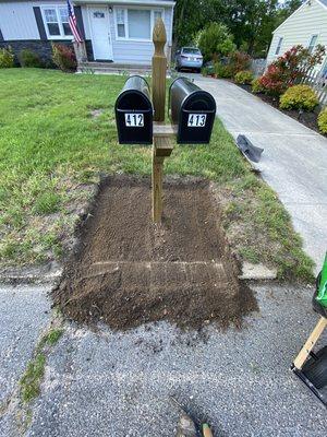 Preparing an area around mailbox to plant some flowers