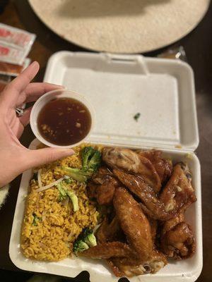 Sticky wings with vegetables fried rice with extra sticky sauce on the side